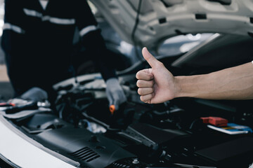 Customer thumbs up for quality marks satisfaction, car repair services, and maintenance, and...