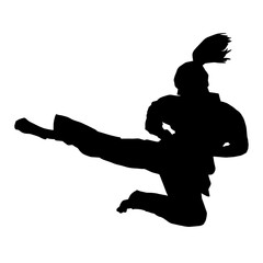 Silhouette of a woman kicking pose. Silhouette of a female martial art in action pose. - obrazy, fototapety, plakaty