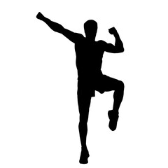 Silhouette of a sporty male in action pose at the gym. Silhouette of a slim man in aerobics workout pose.