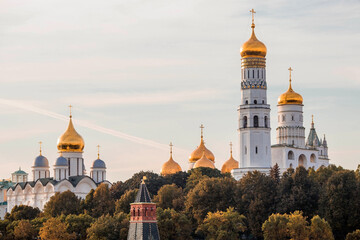Fototapeta na wymiar MOSCOW, RUSSIA - SEPTEMBER 26, 2023: View of Moscow on an autumn evening at sunset. Kremlin towers. The Grand Kremlin Palace, the Assumption and Annunciation Cathedrals. A popular tourist attraction.