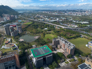 National Taipei University Aerial View at Sanxia, New Taipei City, Taiwan. Beautiful campus with sunset and green grass.