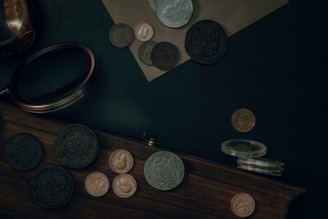 Numismatics. Old collectible coins on the table. Top view. - 660361694