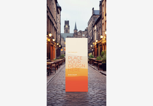Frame Poster Billboard Mockup: White Sign Sitting on the Sidewalk with Tables and Chairs on it and Street Light