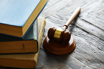 Judges gavel on wooden desk. Law firm concept.
