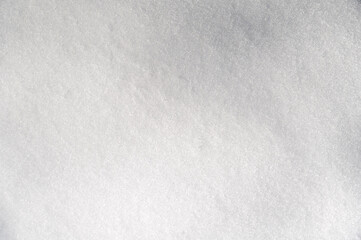 texture of pure white snow in winter close-up