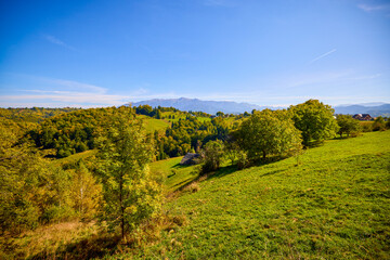Fototapeta na wymiar Mountain landscape from the rural areas of the Carpathian mountains in Romania.