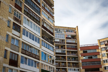 Bright brick apartments building with flat windows in visaginas lithuania