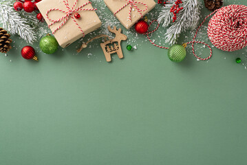 Santa's gift-making station: Top view of craft paper boxes, wrapping rope, wooden reindeer...