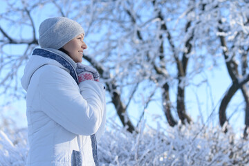 Fototapeta na wymiar Portrait of a beautiful girl in winter