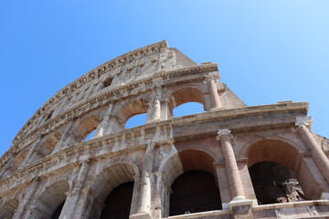rome coliseum with blue sky