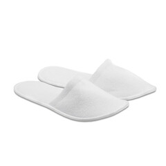 A pair of white disposable textile slippers on a transparent background. PNG. Side view.