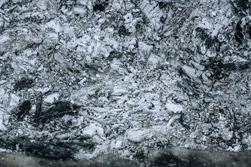 Background, texture of gray ash of burnt firewood. Photography, top view, abstraction.