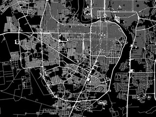 Vector road map of the city of  Nuevo Laredo in Mexico with white roads on a black background.