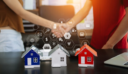 balancing the property sector The real estate agent is explaining the house style to see the house...