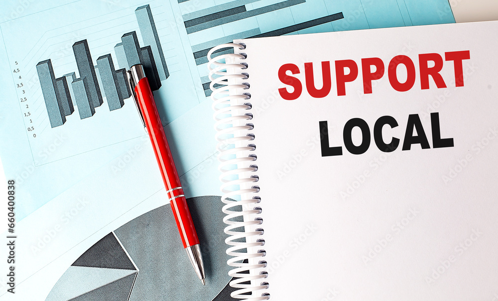 Poster support local text on a notebook with pen on a chart background