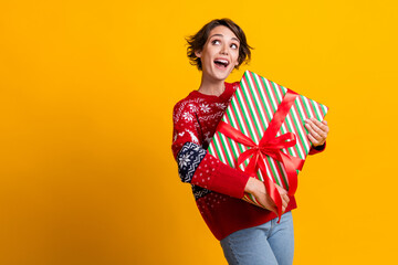 Photo of excited girl with bob hair dressed sweatshirt hold present box look at discount empty...