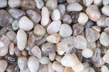Closeup of various colorful stones quartz, marbles, ore minerals, gems use as ornament and decoration jewelry that contain spiritual force human believes