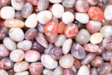 Closeup of various colorful stones quartz, marbles, ore minerals, gems use as ornament and...