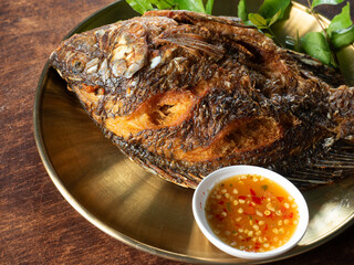 deep fried tilapia fish with dipping sauce