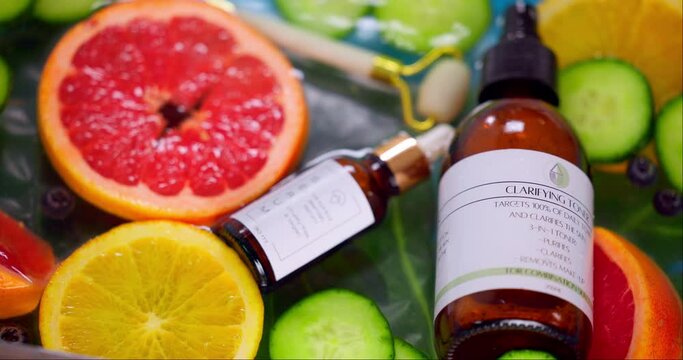 Product, skincare or vitamin c for brand, cosmetics and natural ingredients for wellness, healthy skin or fruit. Fresh, organic and vegan with water, hydrated or clean for beauty, roller and glow