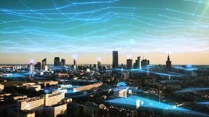 Aerial of smart city with glowing blue connection net. Modern network communication in the downtown. IoT, Telecommunication, Social media, 5G, 6G. High tech data exchange. Futuristic web concept, 4K - Powered by Adobe