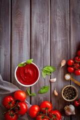 Italian tomato sauce for pasta - passata with tomatoes and basil