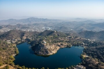 Fototapeta na wymiar Aerial view of Nakki Lake and Mount Abu, a hill station in Rajasthan, India. Generative AI