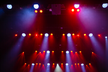Colorful concert lights on empty stage