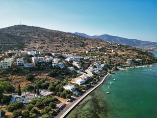 Obraz premium Aerial view of the small town of Elounda Bay, located on the Greek island of Crete