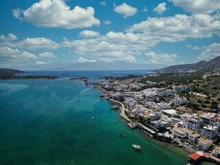 Naklejka na ściany i meble Aerial view of the small town of Elounda Bay, located on the Greek island of Crete
