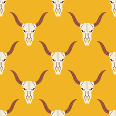 Vector western seamless pattern with cow skull. Buffalo skull on yellow background. Wild west concept.