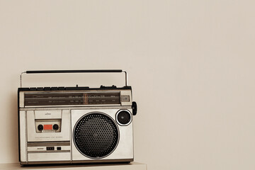 Old radio cassette background. Eighties music on portable radio. Image for music poster design