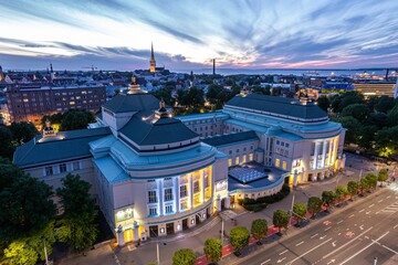 Vibrant cityscape illuminated by the bright lights of the buildings: Estonia concert hall