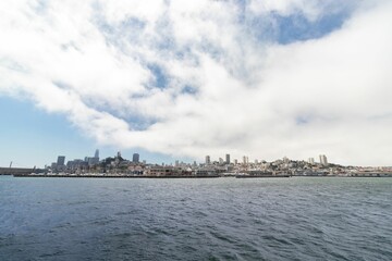 Fototapeta premium Aerial view of the city of San Francisco with the body of water in the foreground