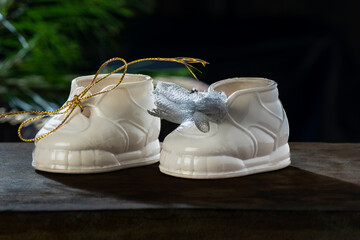 white baby shoe with blur background