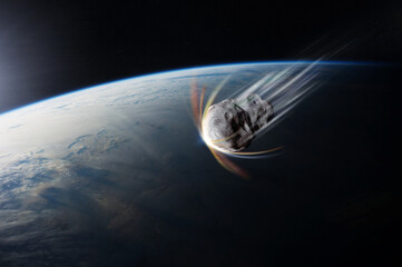 Asteroid in outer space near Earth planet. Meteorite on orbit of Earth. Elements of this image...