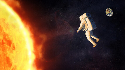 Cosmonaut floating in outer space next to the Sun. Elements of this image furnished by NASA.