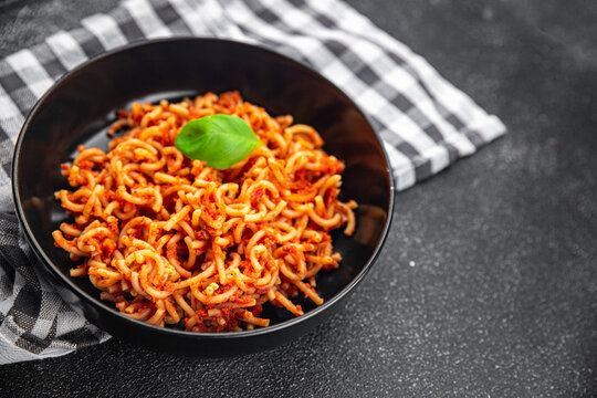 pasta bolognese sedanini rigati tomato sauce eating cooking appetizer meal food snack on the table copy space food background rustic top view
