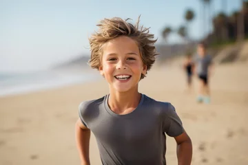 Fotobehang Headshot portrait photography of an active kid male jogging on the beach. With generative AI technology © Markus Schröder