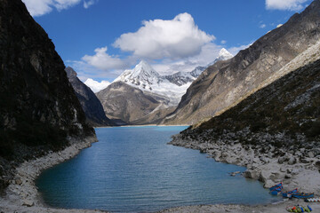 Lake Parón, the largest turquoise lake in the Cordillera Blanca, located in the Peruvian Andes, with the Artesonraju mountain peak (aka “Paramount”) in the background. Huascaran National Park, Peru