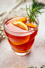 christmas mulled wine cocktail citrus and rosemary traditional drink new year holiday appetizer meal food snack on the table copy space food background rustic top view