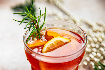 christmas mulled wine cocktail citrus and rosemary traditional drink new year holiday appetizer meal food snack on the table copy space food background rustic top view - obrazy, fototapety, plakaty