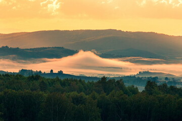 South Ural, Ural mountains in summer. Sunset in the mountains. The top of the mountain range. Summer day.