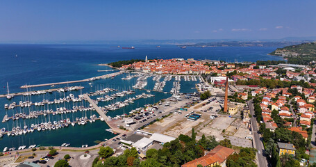 Aerial view of the old fishing town, Izola, on an impressive summer day in Slovenia, Europe. Beautiful seascape of the Adriatic Sea
