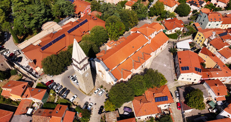 Aerial view of Izola, Church of St. Maurus, Gothic bell tower, a town in southwestern Slovenia on the Adriatic coast of the Istrian peninsula