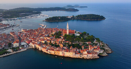 Rovinj Old Town historic peninsula, aerial view at sunrise, Church of Saint Euphemia, famous tourist destination in Istria region of Croatia