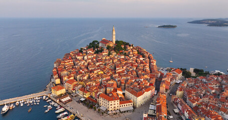 Rovinj Old Town historic peninsula, aerial view at sunrise, Church of Saint Euphemia, famous tourist destination in Istria region of Croatia