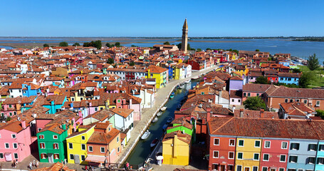 Colorful houses of Burano Island, Church of Saint Martin Bishop, Campanile Pendente, Venice, Italy