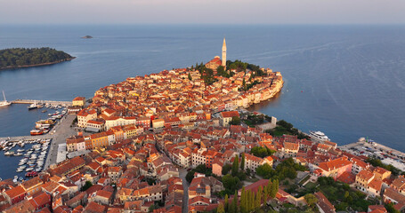 Aerial view of the beautiful Old Town of Rovinj in Croatia at sunrise, Church of Saint Euphemia, Istria