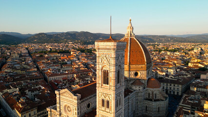 Aerial close view of the Florence Cathedral (Duomo di Firenze) at sunset, Italy - obrazy, fototapety, plakaty